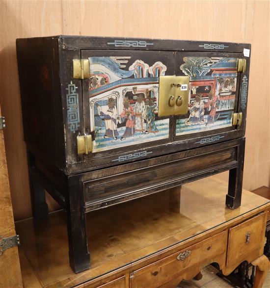 A Chinese polychrome lacquer cabinet on stand W.84cm